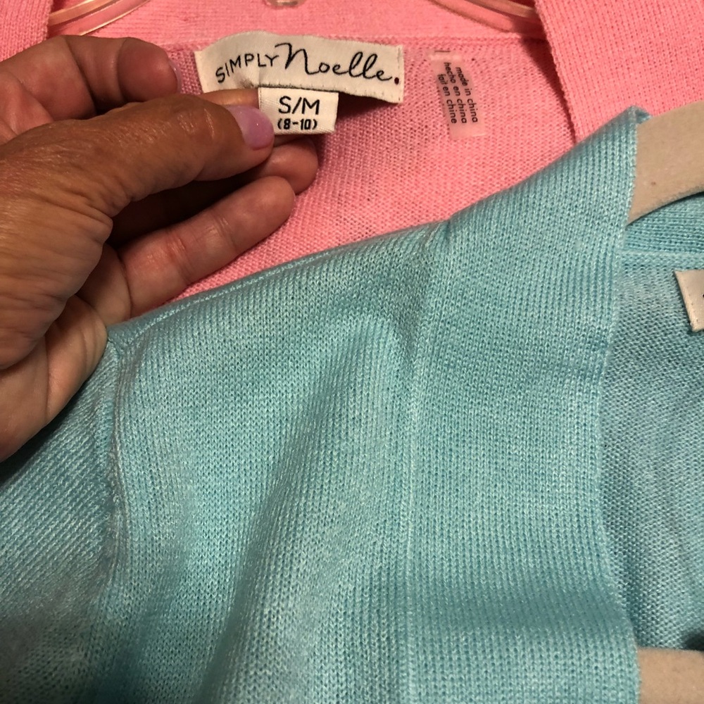 Pink and eggshell blue cardigans.  Both small